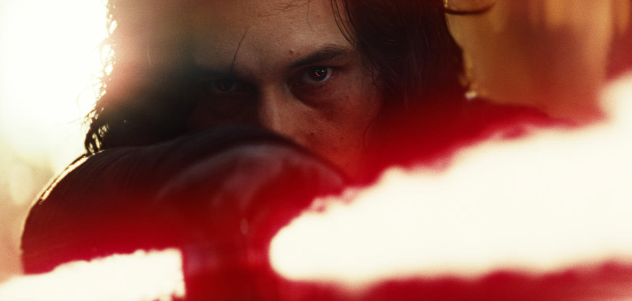 This image released by Lucasfilm shows Adam Driver as Kylo Ren in a scene from the upcoming “Star Wars: The Last Jedi,” (Industrial Light & Magic/Lucasfilm via AP)