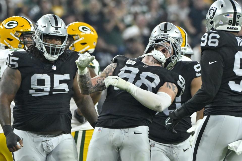 Las Vegas Raiders' Maxx Crosby reacts after sacking Green Bay Packers' Jordan Love during the second half of an NFL football game Monday, Oct. 9, 2023, in Las Vegas. (AP Photo/David Becker)