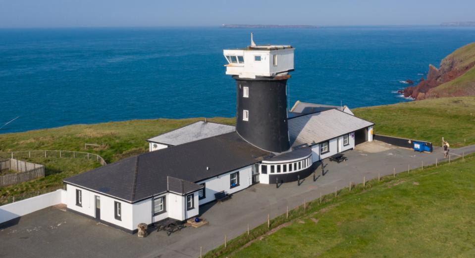 The restored lighthouse sits on the edge of the Pemrokeshire coast (SWNS)