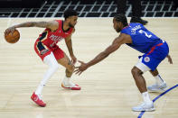 Los Angeles Clippers forward Kawhi Leonard (2) defends against New Orleans Pelicans guard Nickeil Alexander-Walker (6) during the second quarter of an NBA basketball game Wednesday, Jan. 13, 2021, in Los Angeles. (AP Photo/Ashley Landis)