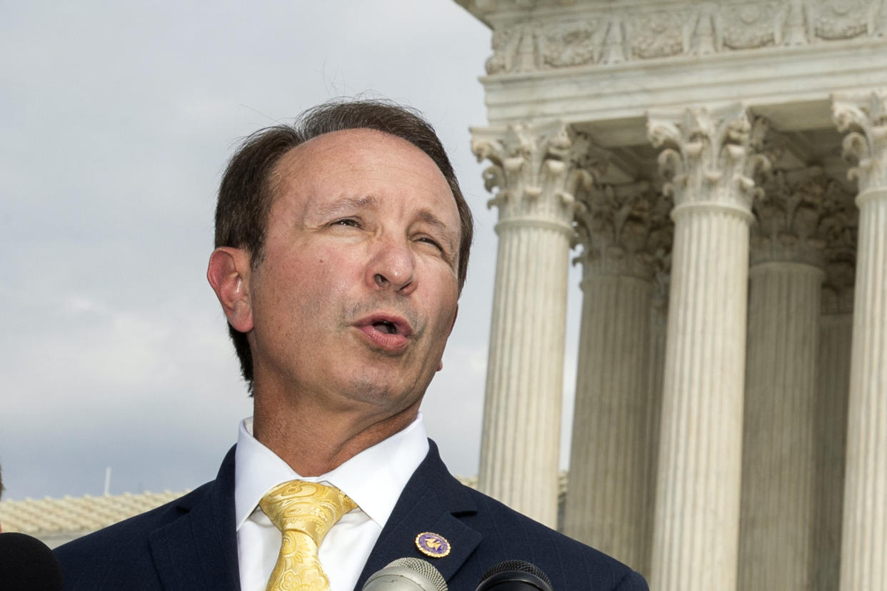 FILE - In this Sept. 9, 2019, file photo, Louisiana Attorney General Jeff Landry speaks in front of the U.S. Supreme Court in Washington. The Biden administration’s suspension of new oil and gas leases on federal land and water was blocked Tuesday, June 15, 2021, by a federal judge in Louisiana.  U.S. District Judge Terry Doughty's ruling came in a lawsuit filed in March by Louisiana’s Republican attorney general, Jeff Landry and officials in 12 other states. Doughty's ruling granting a preliminary injunction to those states said his order applies nationwide. (AP Photo/Manuel Balce Ceneta, File)