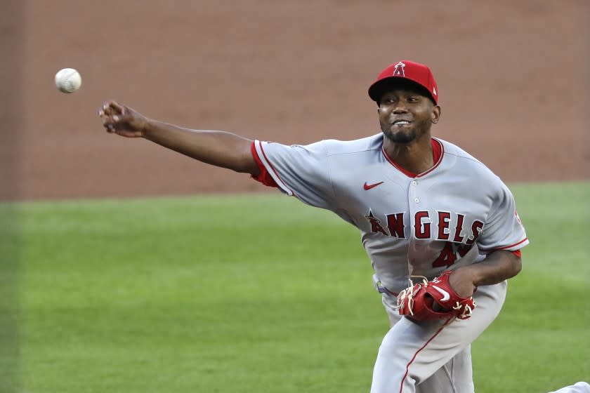 Los Angeles Angels starting pitcher Julio Teheran throws against the Seattle Mariners.