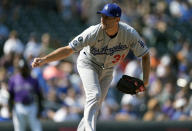 Los Angeles Dodgers starting pitcher Max Scherzer works against the Colorado Rockies in the first inning of a baseball game Thursday, Sept. 23, 2021, in Denver. (AP Photo/David Zalubowski)