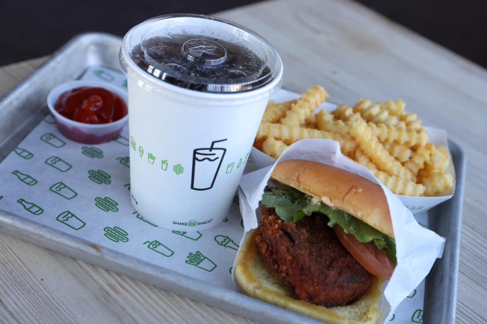 A meal is seen at Shake Shack at the Woodbury Common Premium Outlets in this photo illustration in Central Valley, New York, U.S., February 15, 2022. REUTERS/Andrew Kelly