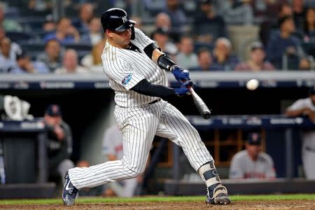 FILE PHOTO: Oct 9, 2018; Bronx, NY, USA; New York Yankees catcher Gary Sanchez (24) hits a ground rule double during the fifth inning against the Boston Red Sox in game four of the 2018 ALDS playoff baseball series at Yankee Stadium. Mandatory Credit: Brad Penner-USA TODAY Sports