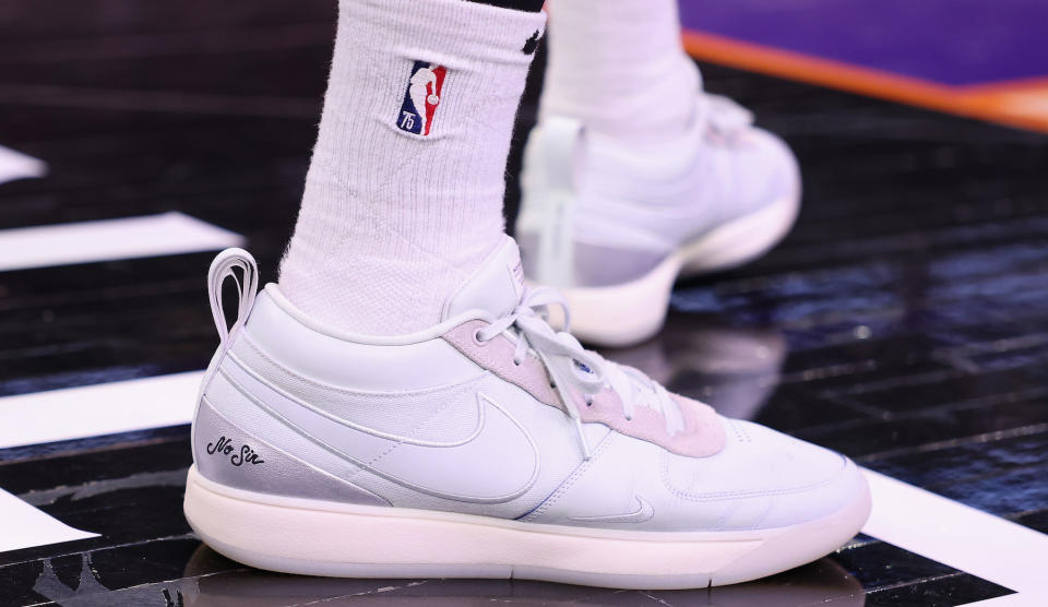 PHOENIX, ARIZONA - NOVEMBER 22: Detail of Nike sneakers worn by Devin Booker #1 of the Phoenix Suns during the second half of the NBA game at Footprint Center on November 22, 2023 in Phoenix, Arizona. The Suns defeated the Warriors 123-115. NOTE TO USER: User expressly acknowledges and agrees that, by downloading and or using this photograph, User is consenting to the terms and conditions of the Getty Images License Agreement.  (Photo by Christian Petersen/Getty Images)