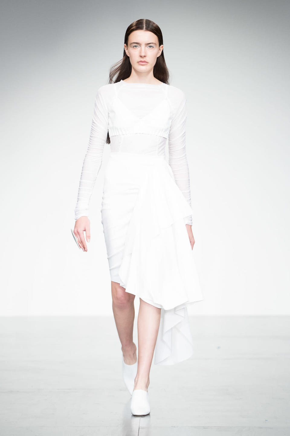 <p>Paula Knorr was given the responsibility off kicking off London Fashion Week and she took it in her stride. The designer sent models down the runway in this season’s biggest colour trend, all white. <em>[Photo: PA]</em> </p>