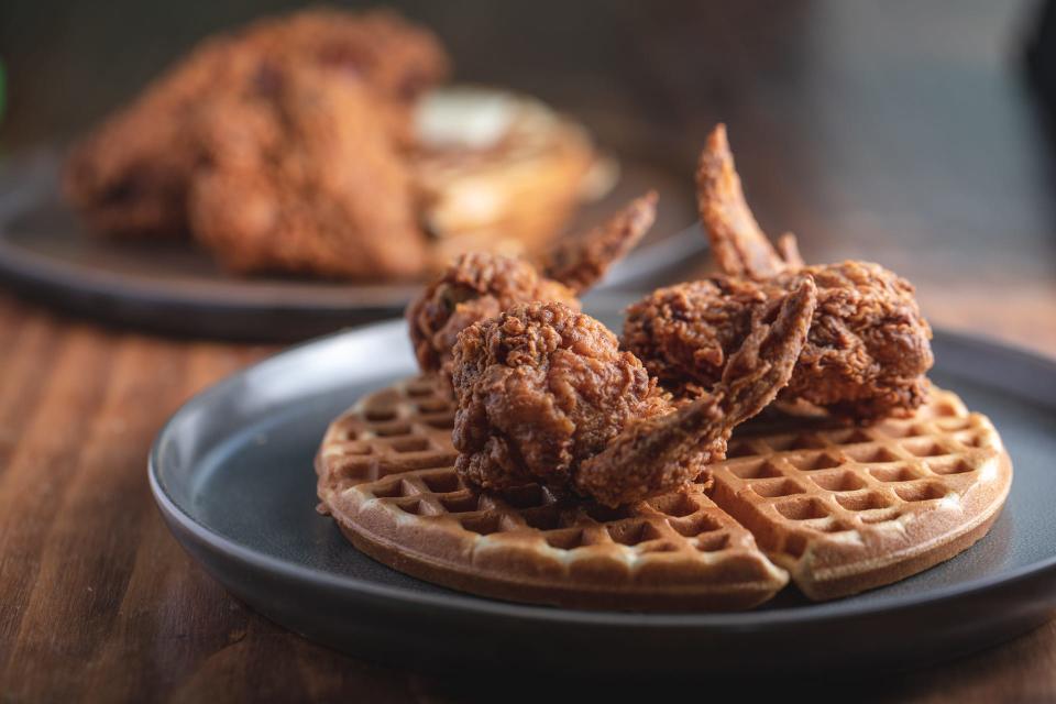 Fixins Soul Kitchen is slated to open in downtown Detroit. Owner Kevin Johnson, a former NBA all star and mayor of Sacramento, says Fixins' signature dish is chicken and waffles.