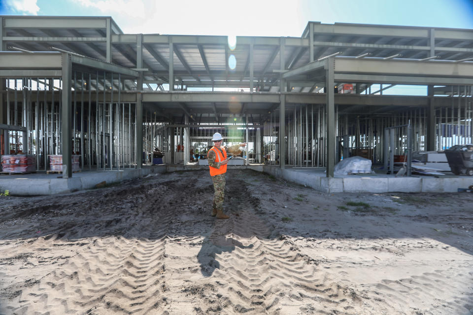 Lt. Nicholas Cap, Natural Disaster Recovery Division, USAF, shows digital twin thought augmented reality at new headquarters building (Lucas Thompson / NBC News)