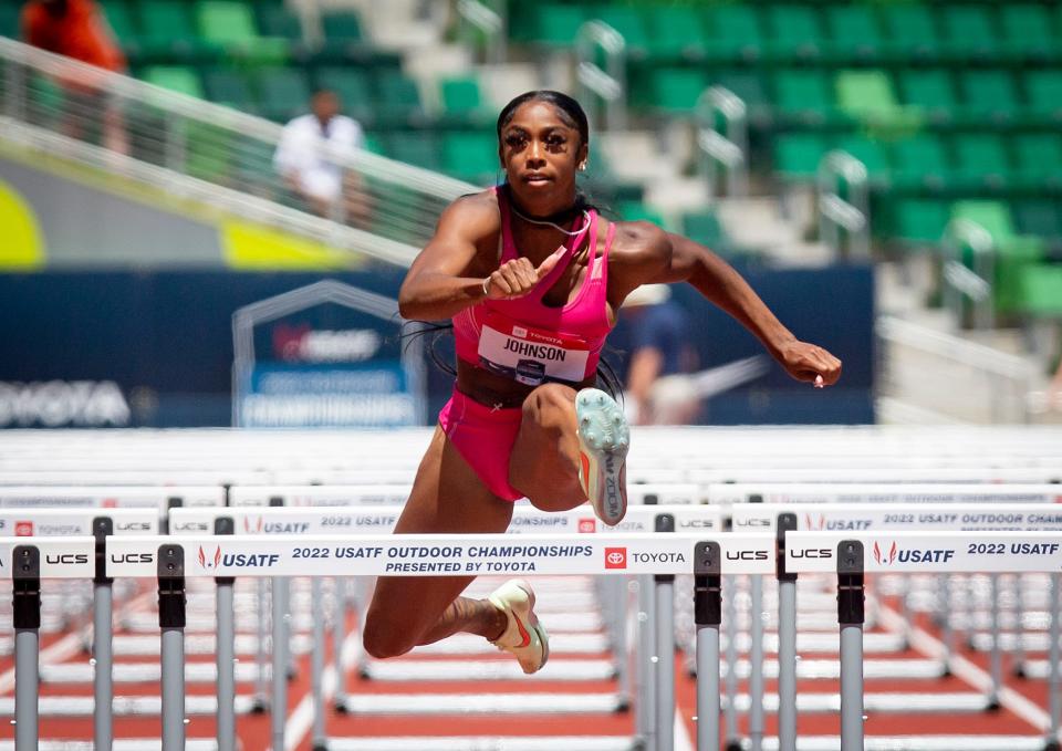 Alaysha Johnson clears the final hurdle to advance to the finals of the women's 100 meter hurdles at the USA Track and Field Championships Saturday at Hayward Field in Eugene.