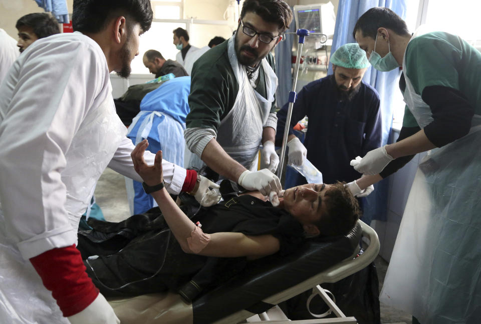 <p>Afghan Injured men receives a treatment at a hospital after a suicide attack in Kabul, Afghanistan, Saturday Jan. 27, 2018. (Photo: Rahmat Gul/AP) </p>