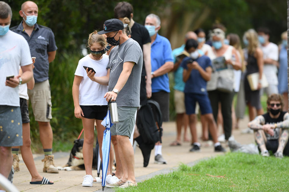 People line up to be tested at a pop-up COVID-19 testing facility at Avalon on Friday. Source: AAP