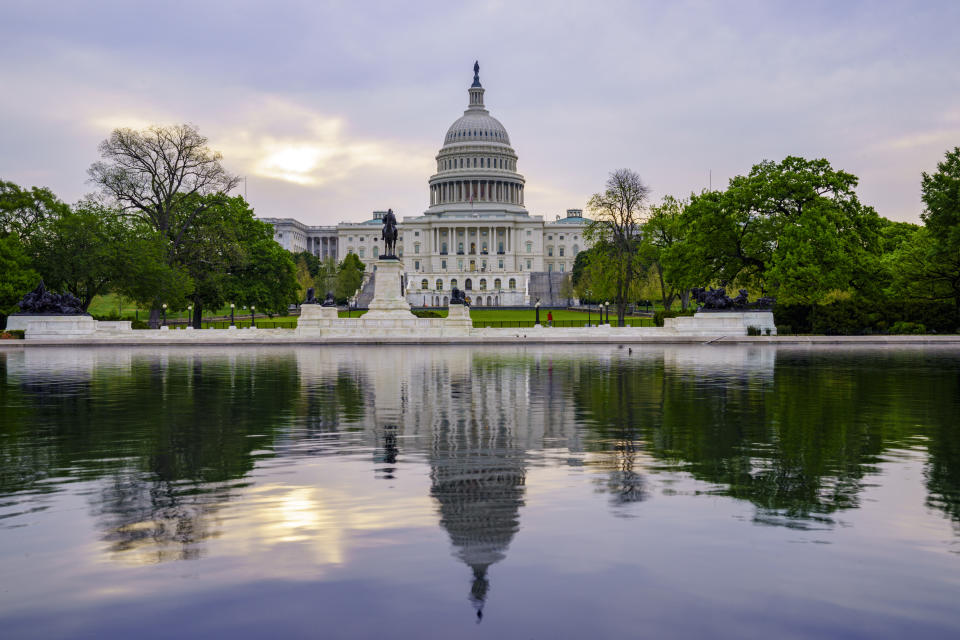 The Capitol is seen in Washington, early Wednesday, April 28, 2021, as President Joe Biden prepares to address House and Senate lawmakers on his first 100 days in office. Biden will speak before a pared-down gathering of mask-wearing legislators due to coronavirus restrictions. (AP Photo/J. Scott Applewhite)