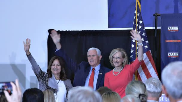 PHOTO: Arizona gubernatorial candidate Karin Taylor Robson (center) is joined by Karen Pence, Left, former Vice-President Mike Pence at an election campaign event in Peoria, Ariz., on Friday, July 22, 2022. (Libby Cathey/ABC News )