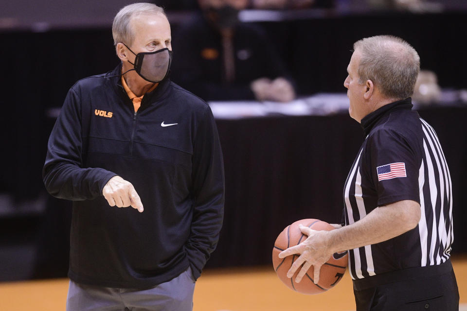 Tennessee coach Rick Barnes speaks to a referee during the team's NCAA college basketball game against Colorado on Tuesday, Dec. 8, 2020, in Knoxville, Tenn. (Caitie McMekin/Knoxville New-Sentinel via AP, Pool)