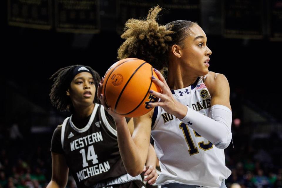 Notre Dame forward Natalija Marshall (15) grabs the rebound during the Western Michigan-Notre Dame NCAA Women’s basketball game on Thursday, December 21, 2023, at Purcell Pavilion in South Bend, Indiana.