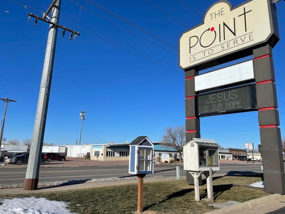 The Point is to Serve church on Kiwanis Avenue in Sioux Falls offers its own Little Free Pantry for those who need food.
