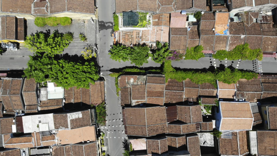 An aerial photo shows quiet streets during social distancing in Hoi An, Vietnam, Friday, July 31, 2020. The old town, Vietnam's top tourist attraction, starts two weeks of social distancing on Friday morning in an attempt to contain the spread of the coronavirus. (AP Photo/Hieu Dinh)