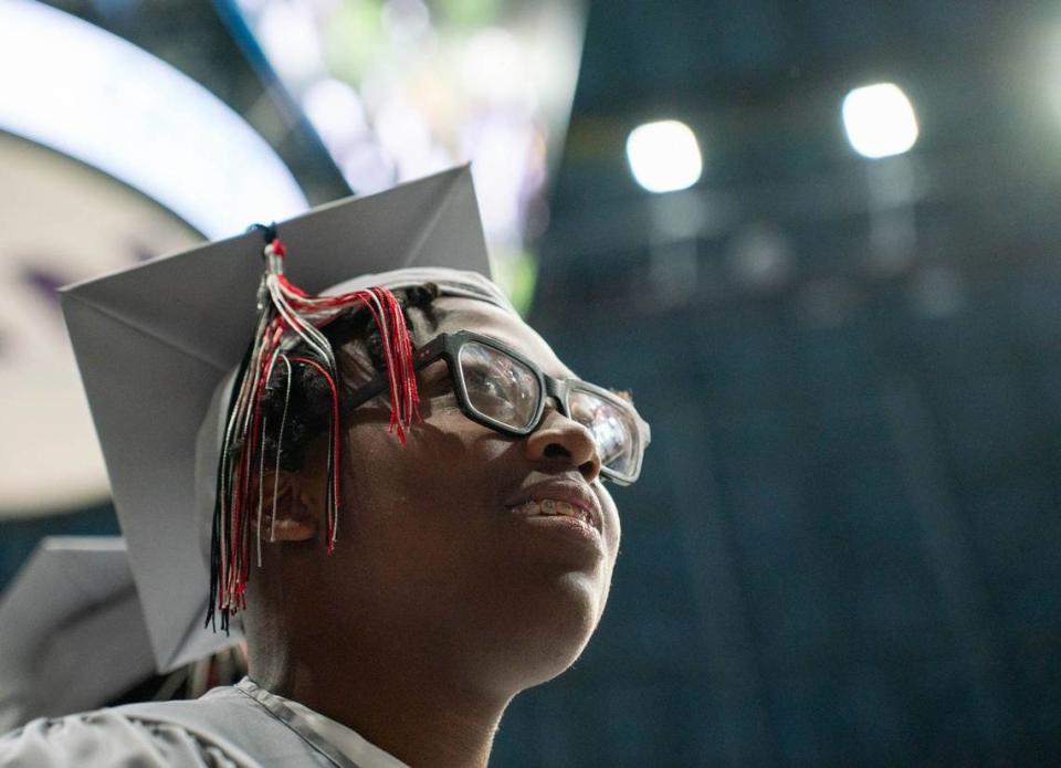 A David W. Butler High School graduate lines up before going onto the stage to receive his diploma at the Bojangles Coliseum in Charlotte on Monday, June 10, 2024.