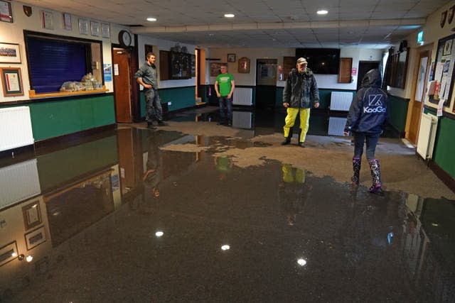 The rugby club's clubhouse was also affected by the deluge (Owen Humphreys/PA)