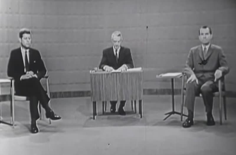 Senator John F. Kennedy and Vice President Richard Nixon sit prior to the start of the 1960 U.S. presidential election debate, in Chicago