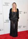 <p>Robbie wore a black lace Chanel jumpsuit for the ‘Dreamland’ premiere as part of the Tribeca Film Festival. <em>[Photo: Getty]</em> </p>