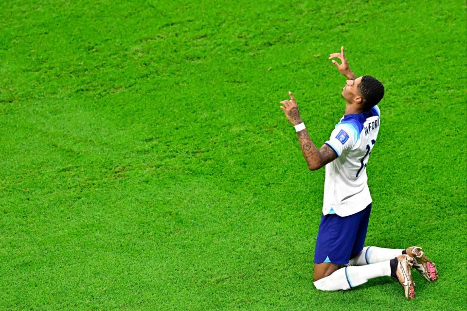 Dedication: Marcus Rashford’s goal celebration  (AFP via Getty Images)