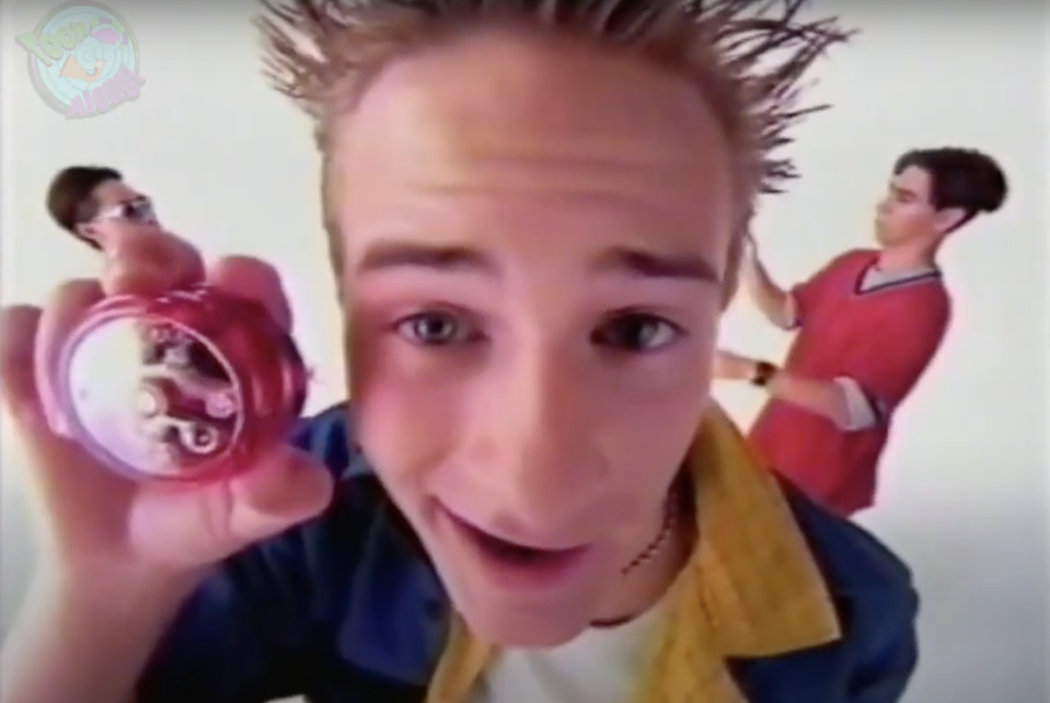 three men playing with yo-yos