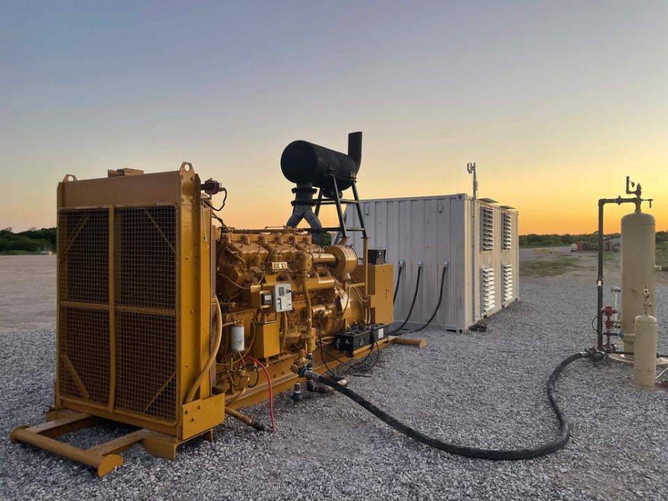 A natural gas generator powering a bitcoin mining data centre on an oil field in North Texas. (Matt Lohstroh/AFP via Getty Imag)