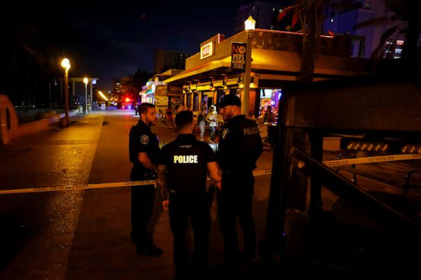 PHOTO: Law enforcement officers are seen on a crime scene as they respond to a shooting at Hollywood Beach, May 29, 2023 in Hollywood, Florida. (Eva Marie Uzcategui/Getty Images)
