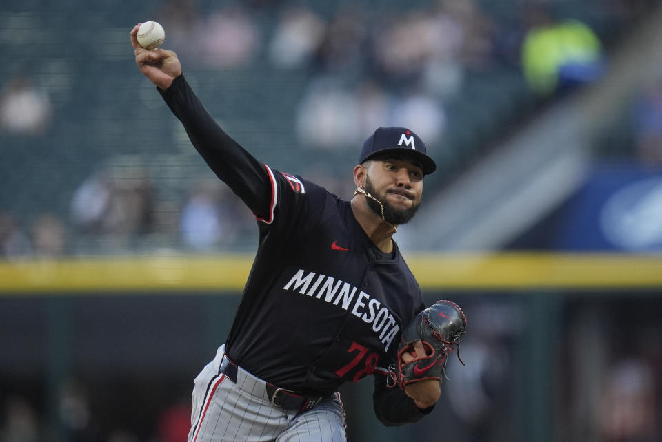 Minnesota Twins starting pitcher Simeon Woods Richardson throws against the Chicago White Sox during the first inning of a baseball game Tuesday, April 30, 2024, in Chicago. (AP Photo/Erin Hooley)