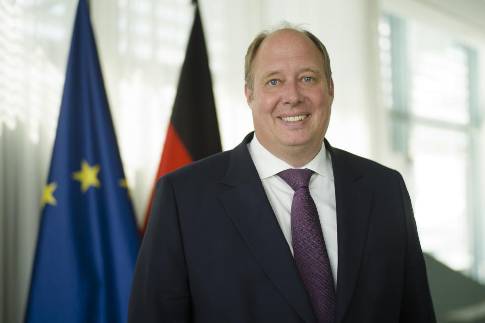 Helge Braun Head of Federal Chancellery and German Minister for Special Task poses for a photo after an interview with the Associated Press at the chancellery in Berlin, Germany, Tuesday, July 14, 2020. Helge Braun, says Germany has managed to flatten the curve of new coronavirus infections to three per 100,000 inhabitants a week, a very low rate by international comparison, and that the country can avoid a 'second wave' of infections in the fall if citizens keep following rules on social distancing, wearing masks and, if necessary, quarantining in areas that experience spikes in new cases. (AP Photo/Markus Schreiber)