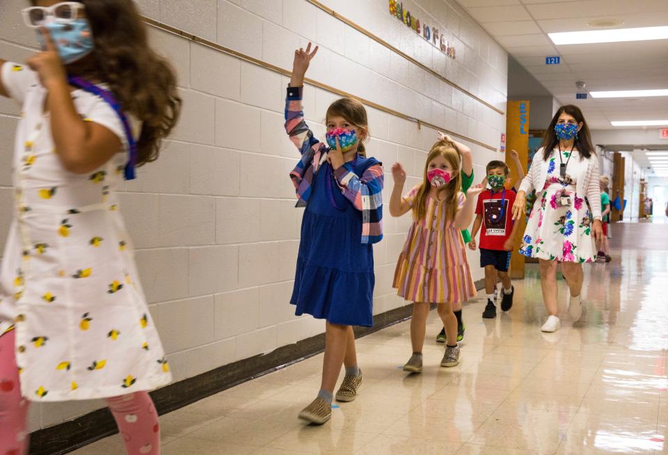 First graders in Julie Fischer's class at J.F. Burns elementary in the Kings Local school district, head to their special, August 31, 2021. Shortly after school started, the school board voted to mandate masks for Pre-K through 6th grade due to increase numbers of COVID-19 and the Delta variant.