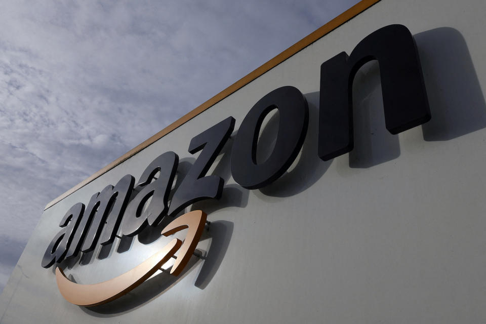 The logo of Amazon is seen at the company logistics center in Lauwin-Planque, northern France, November 15, 2022.  REUTERS/Pascal Rossignol