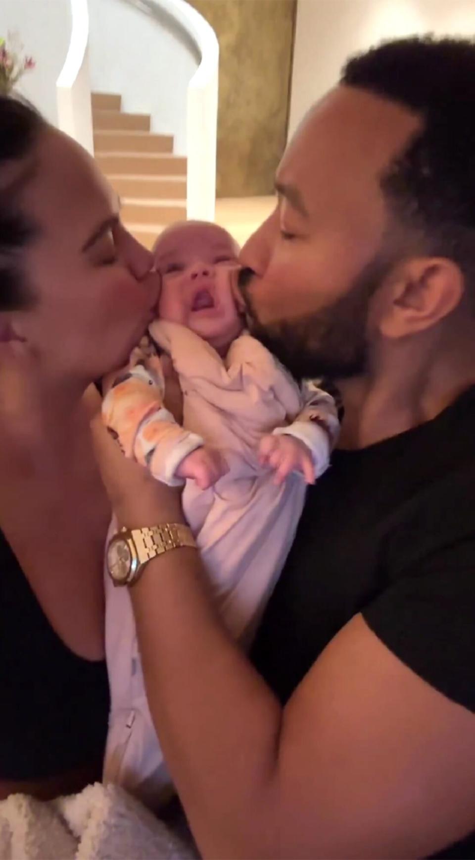 Chrissy Teigen and John Legend Give Baby Daughter Esti a Sandwich Kiss In Adorable New Video