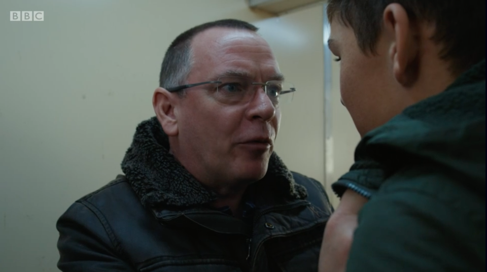 Ian Beale locks Dennis Mitchell in a room on the boat during EastEnders 35th anniversary. (BBC/iPlayer)