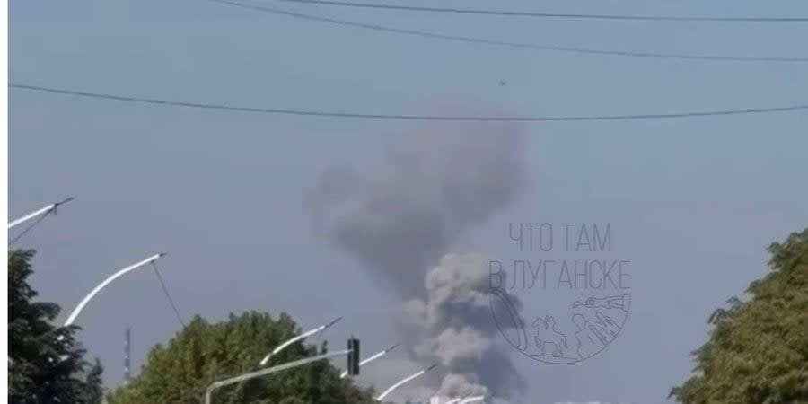Smoke is visible in Luhansk following explosions on May 20