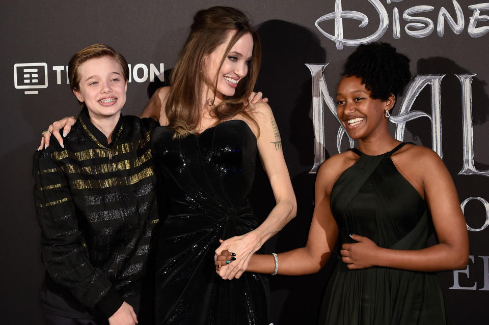 Angelina Jolie and her children Shiloh Jolie-Pitt (left) and Zahara Jolie-Pitt at a premiere in 2019.  (Photo: Mondadori Portfolio via Getty Images)