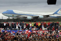 Supporters of President Donald Trump watch as Air Force One lands at a rally held at MBS International Airport, Thursday, Sept. 10, 2020, in Freeland, Mich. (AP Photo/Jose Juarez)