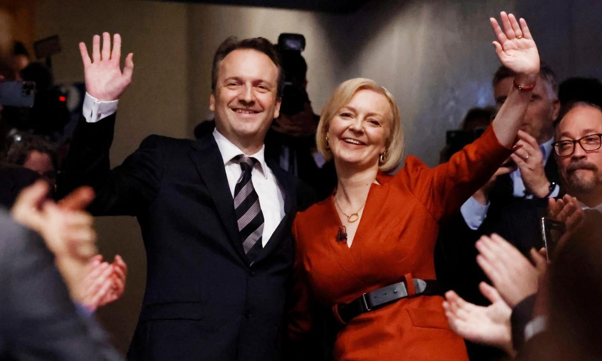 <span>Liz Truss and her husband following her speech at the Conservative party conference, October 2022. </span><span>Photograph: Jeff J Mitchell/Getty Images</span>