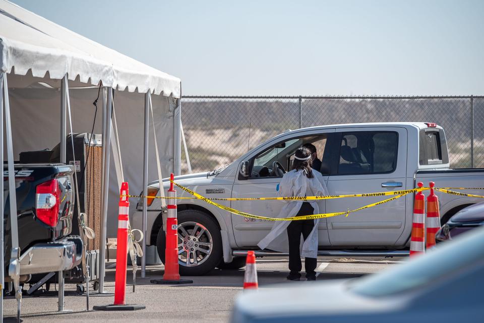 More than 200 vehicles lined up for drive-thru COVID-19 testing in far East El Paso, Texas, on Oct. 14. Many of those waiting for testing said they waited for three hours or more to get tested at the mobile test collection site at the Socorro ISD Student Activities Complex.