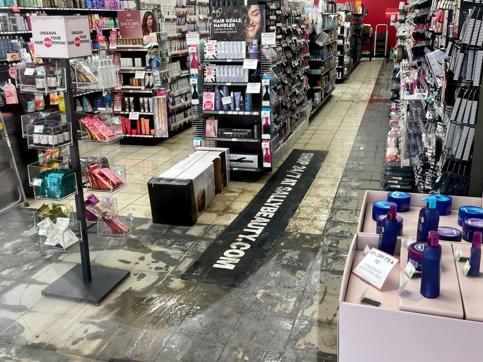 Water damage to part of Sally's Beauty Supply at the New Towne Center strip mall near Ford and Sheldon roads in Canton can be seen on Friday, Aug. 25, 2023. It is one of several businesses closed due to Thursday's big thunderstorm that dumped several inches of rain in the area.