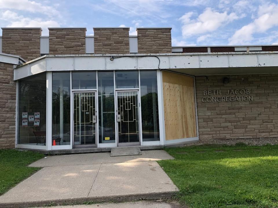 The Beth Jacob Congregation seen Tuesday morning after a brick was thrown threw its front windows on Monday.