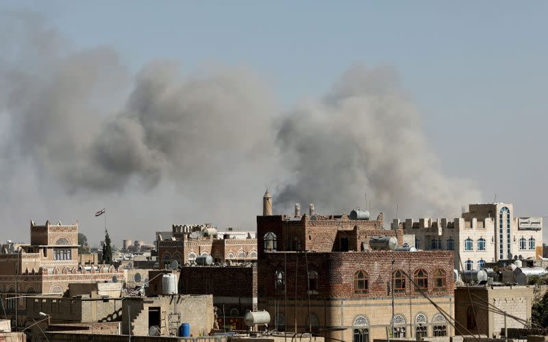 Smoke billows from the sites of Saudi-led air strikes in Sanaa