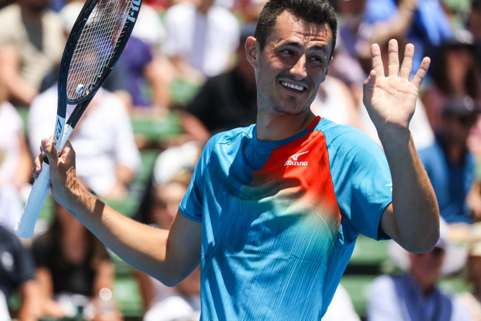 MELBOURNE, AUSTRALIA - JANUARY 9: Bernard Tomic (AUS) smiles at Nick Kyrgios (AUS) during his match against  at the 2019 Kooyong Classic (Photo credit should read Chris Putnam / Barcroft Media via Getty Images)