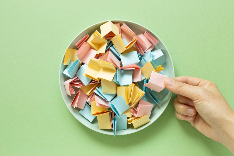 A bowl of colorful paper