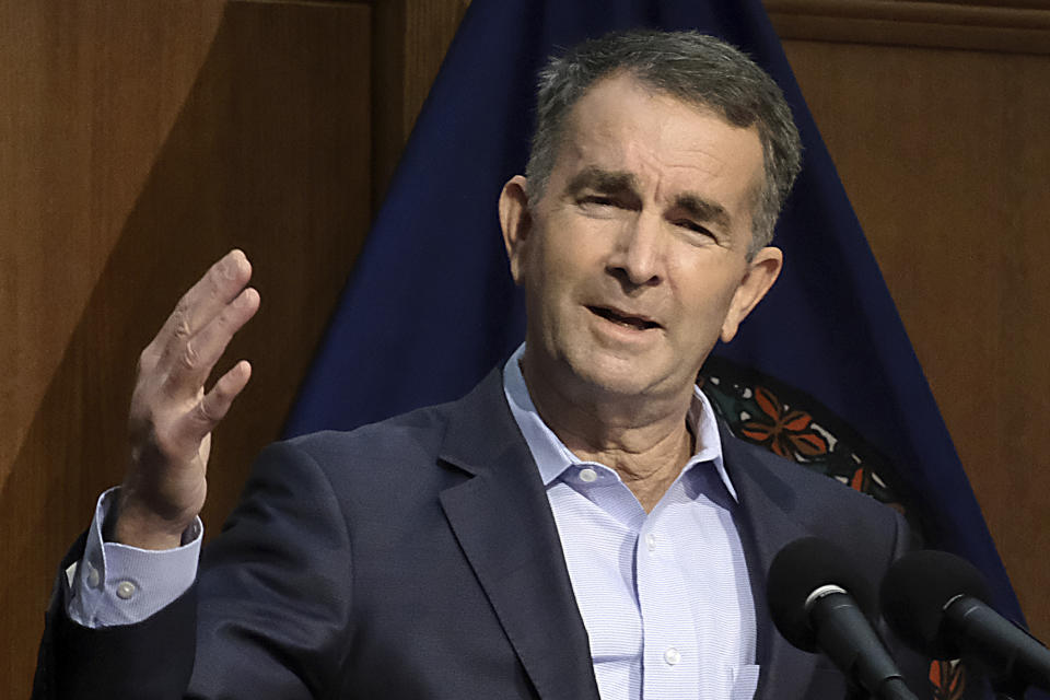 Virginia Gov. Ralph Northam addresses the public and the media while giving new restriction orders for Virginians dealing with the coronavirus during a press conference at the Patrick Henry Building in Richmond, Va., Thursday, Dec. 10, 2020. (Bob Brown/Richmond Times-Dispatch via AP)