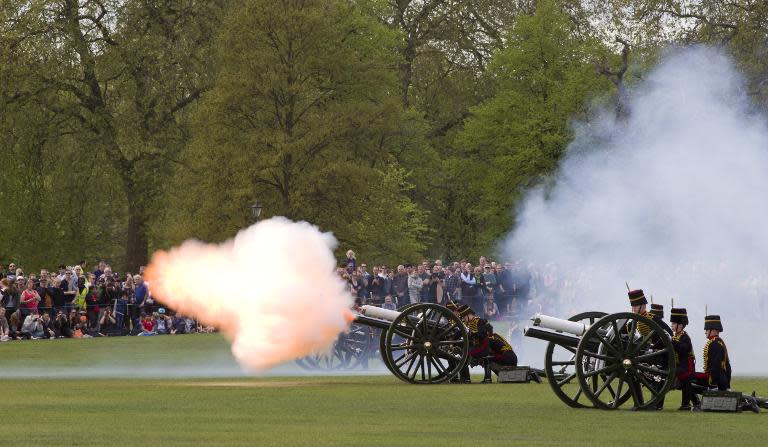 The Kings Troop Royal Horse Artillery fire a First World War era 13-pounder field gun during a 41 gun royal salute in London on May 4, 2015 to mark the birth of the Duke and Duchess of Cambridge's second child