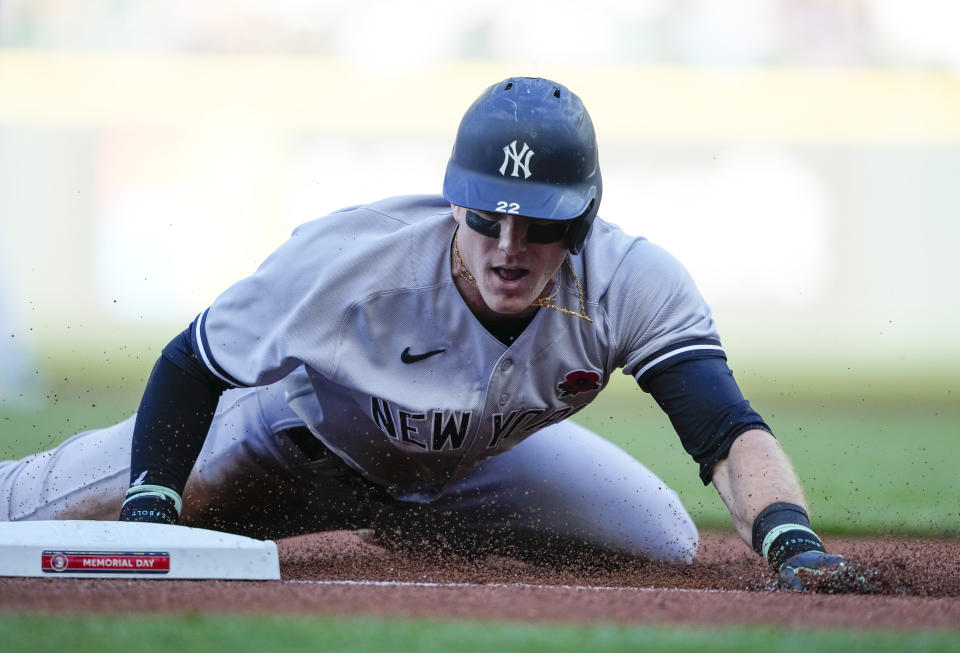 New York Yankees' Harrison Bader advances to third base on a throwing error by Seattle Mariners catcher Cal Raleigh after stealing second base during the second inning of a baseball game Monday, May 29, 2023, in Seattle. (AP Photo/Lindsey Wasson)