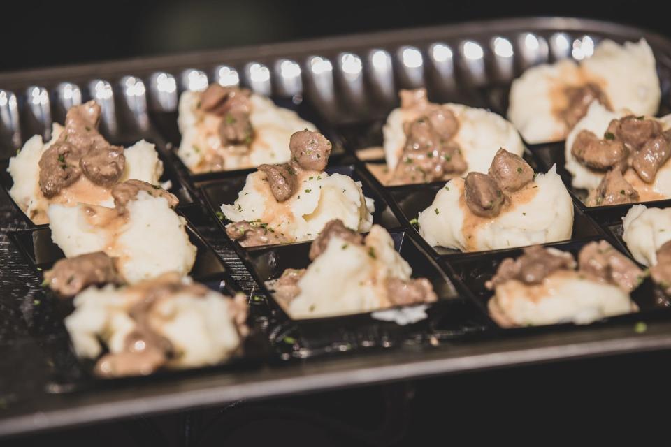 Tasty treats are served up during the IndyStar Wine & Food Experience, held at Clay Terrace outdoor mall in Carmel Ind., on Saturday, Sept. 28, 2019. 